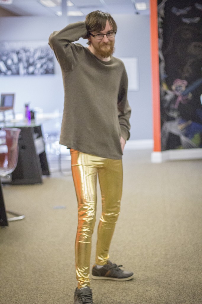 man in gold leggings
