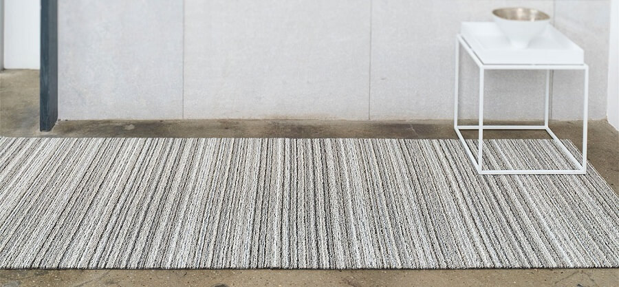 Chilewich woven rug interior design background