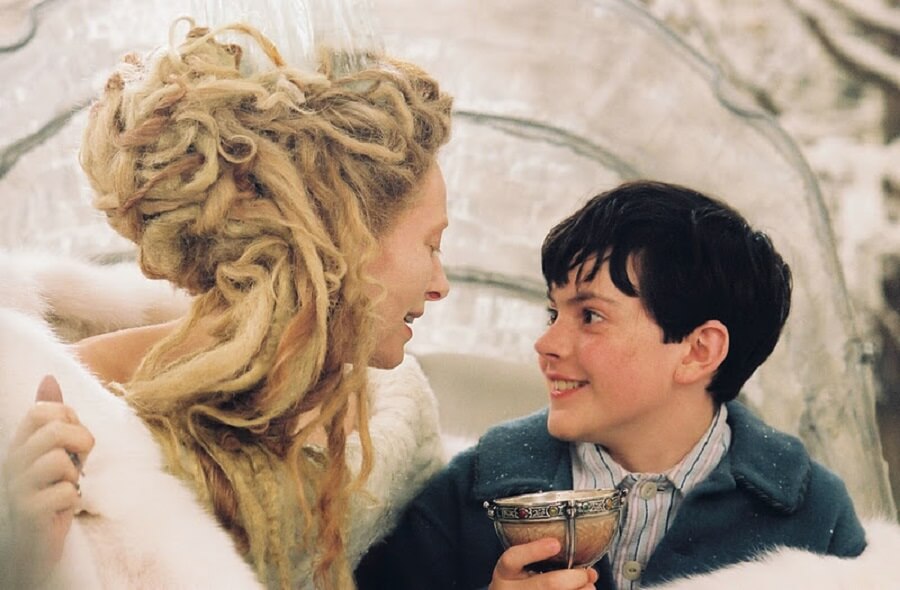 The Queen of Narnia feeding Turkish Delight to Edmund
